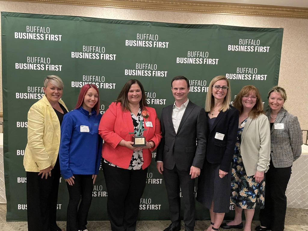 board members, kim, and staff at excellence at healthcare award ceremony