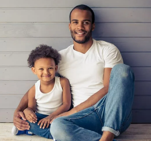 dad sitting with daughter