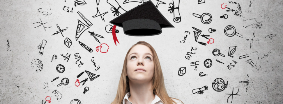 women looking up at grad cap