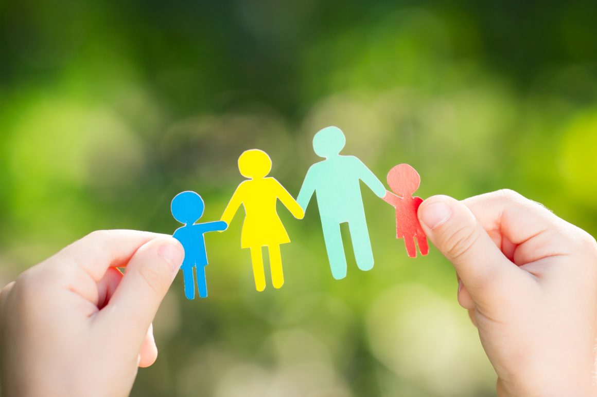 paper cut out of a family