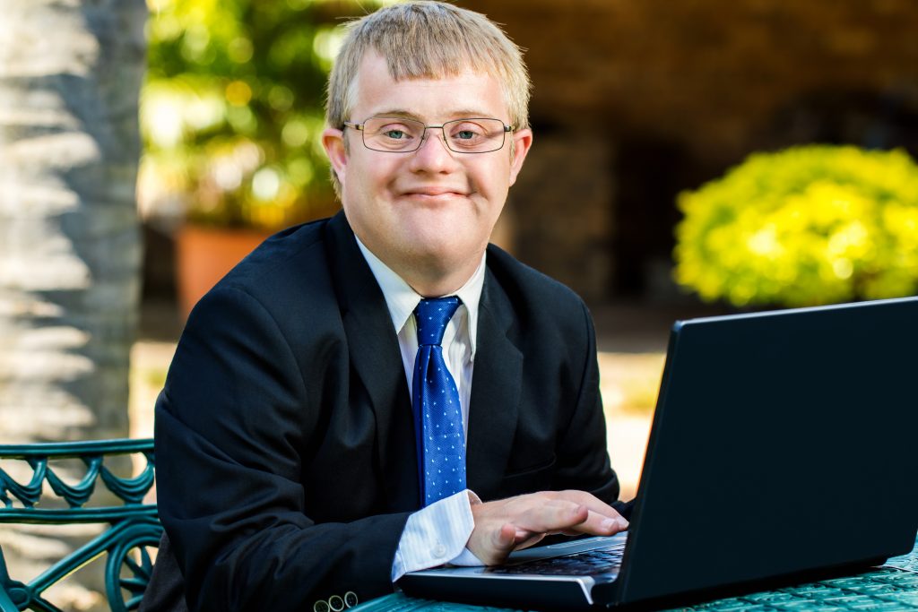 young man working on laptop
